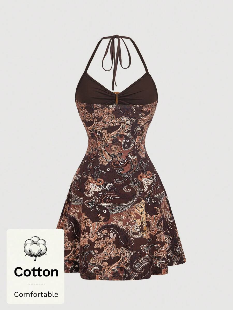 Women's apricot halter mini dress with backless knot and ring detail, sleeveless cami style, flared hem, and boho vacation look