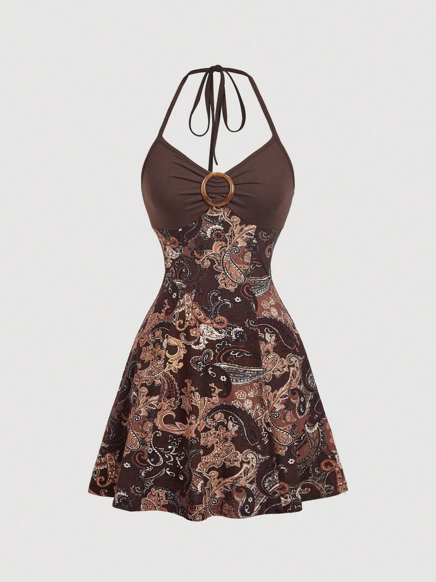 Women's apricot halter mini dress with backless knot and ring detail, sleeveless cami style, flared hem, and boho vacation look