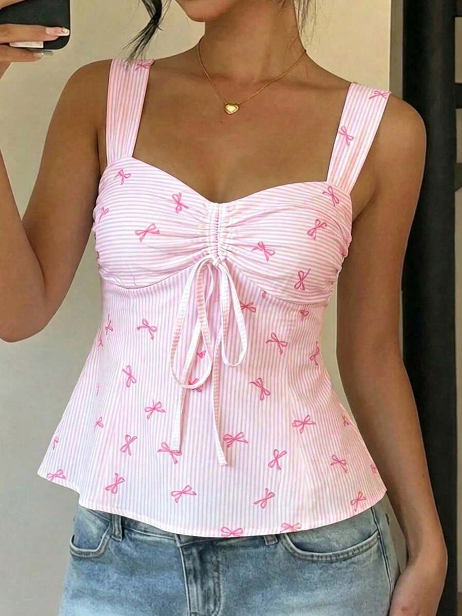 Women's striped camisole tank top with strap neckline, backless knot detail, cold shoulder styling, slim fit, and flared hem for casual vacation or daily wear.
