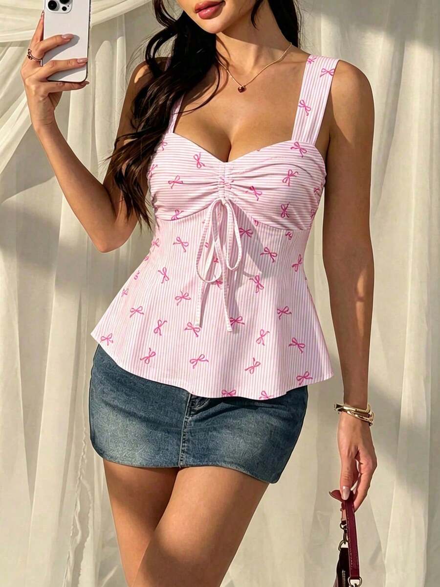 Women's striped camisole tank top with strap neckline, backless knot detail, cold shoulder styling, slim fit, and flared hem for casual vacation or daily wear.