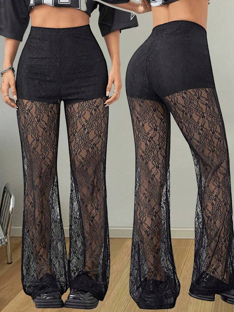 Women's plus size black flare leg pants with high elastic waist in stretchy knit fabric