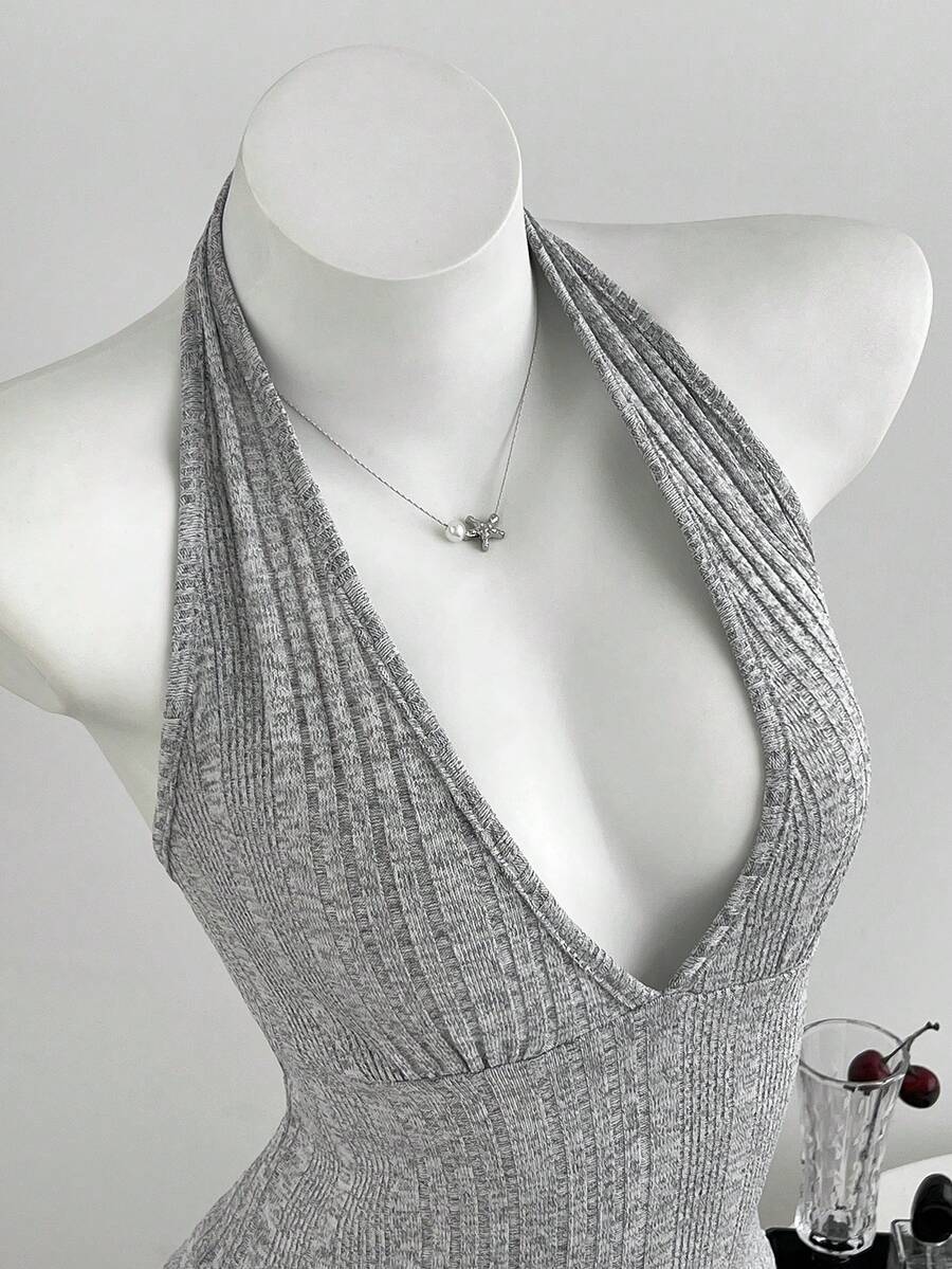Women's light grey slim fit halter tank top featuring an asymmetrical hem and contrast mesh 2-in-1 detail.