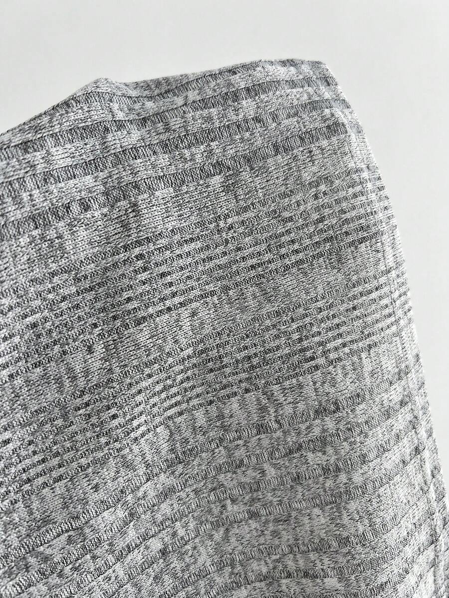 Women's light grey slim fit halter tank top featuring an asymmetrical hem and contrast mesh 2-in-1 detail.