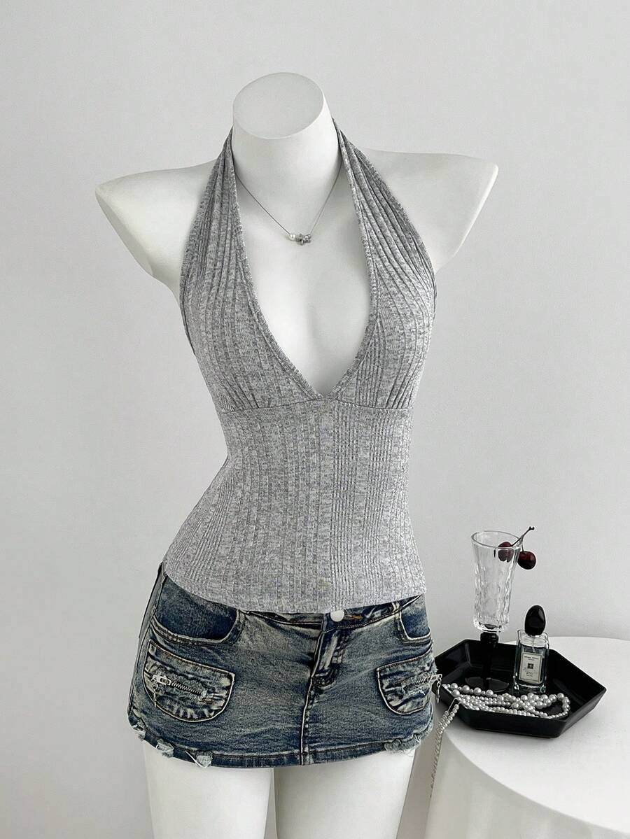 Women's light grey slim fit halter tank top featuring an asymmetrical hem and contrast mesh 2-in-1 detail.