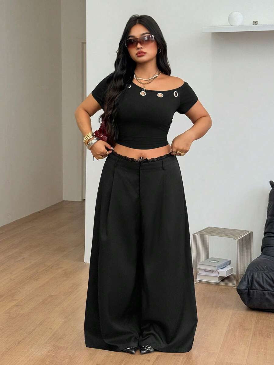 Women's high waist striped wide leg trousers crafted from textured woven fabric with button half-placket detailing.