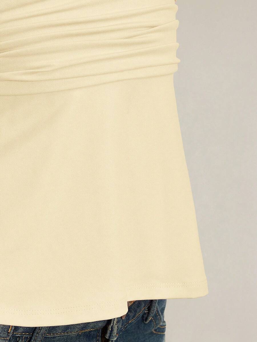 Women's backless halter babydoll tank top featuring a square neckline, slim fit silhouette, and a flared ruffle hem.