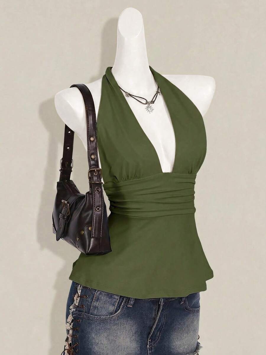 Women's backless halter babydoll tank top featuring a square neckline, slim fit silhouette, and a flared ruffle hem.