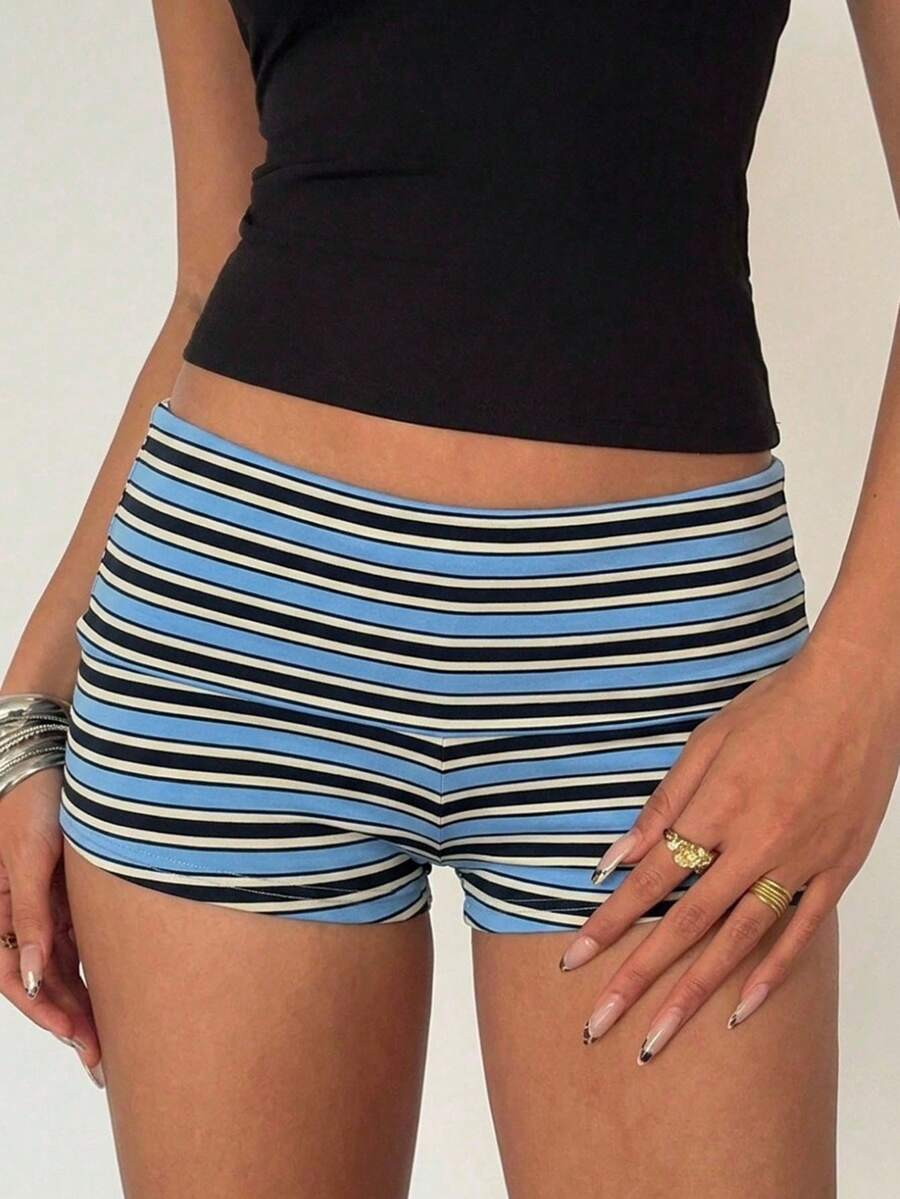 Women's studded PU ultra low waist mini shorts with zipper fly closure, skinny fit, mini length, and plain unlined design.