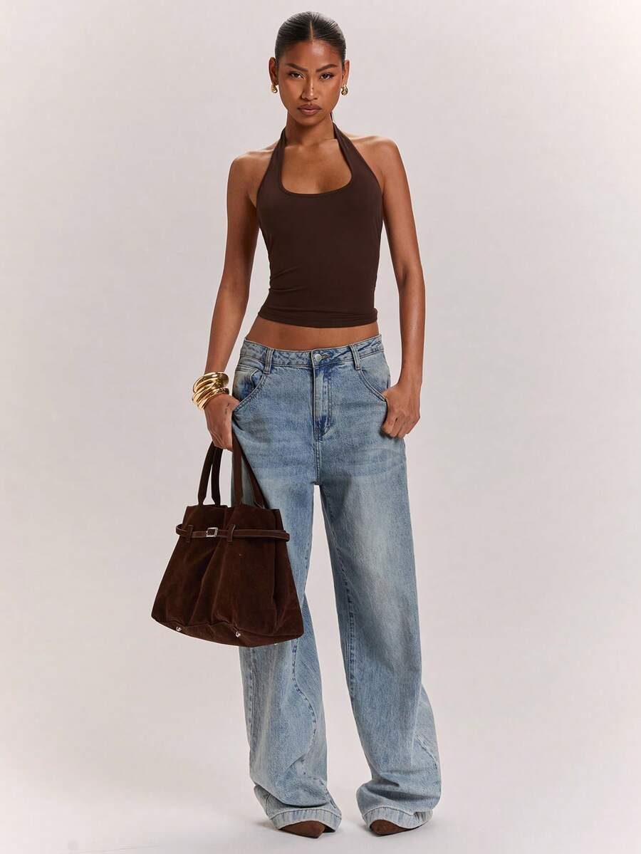 Women's knitted halter tank top with backless twisted knot design and asymmetrical hem