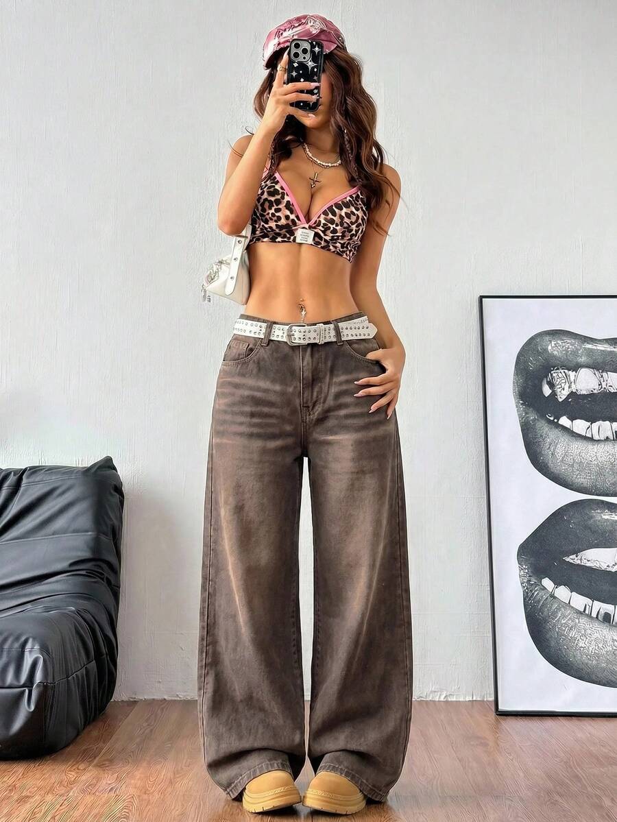 Women's casual loose fit wide leg denim jeans with functional pockets and low waist design.