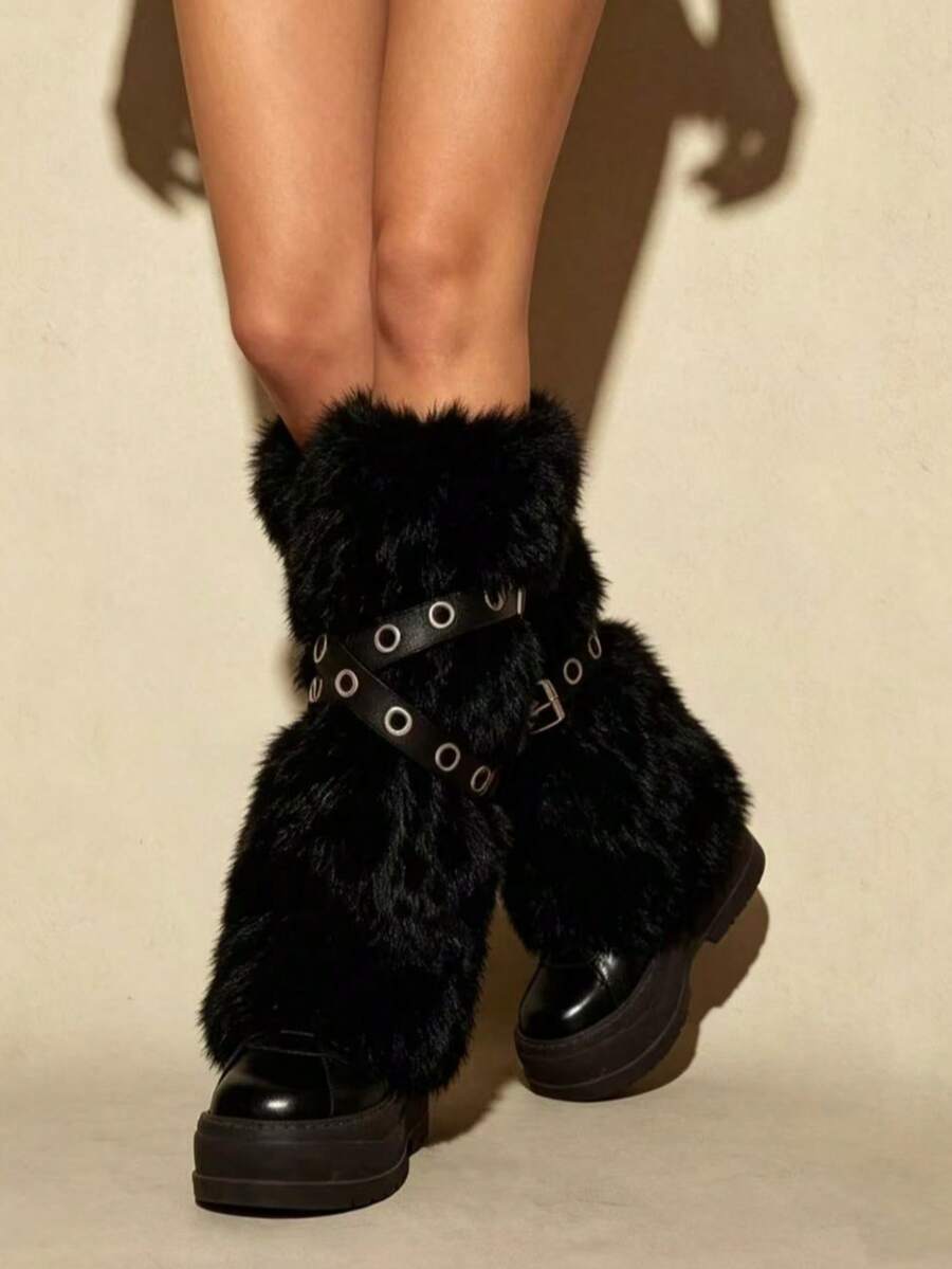 Pair of fuzzy leopard print leg warmers for women in a stylish winter goth aesthetic