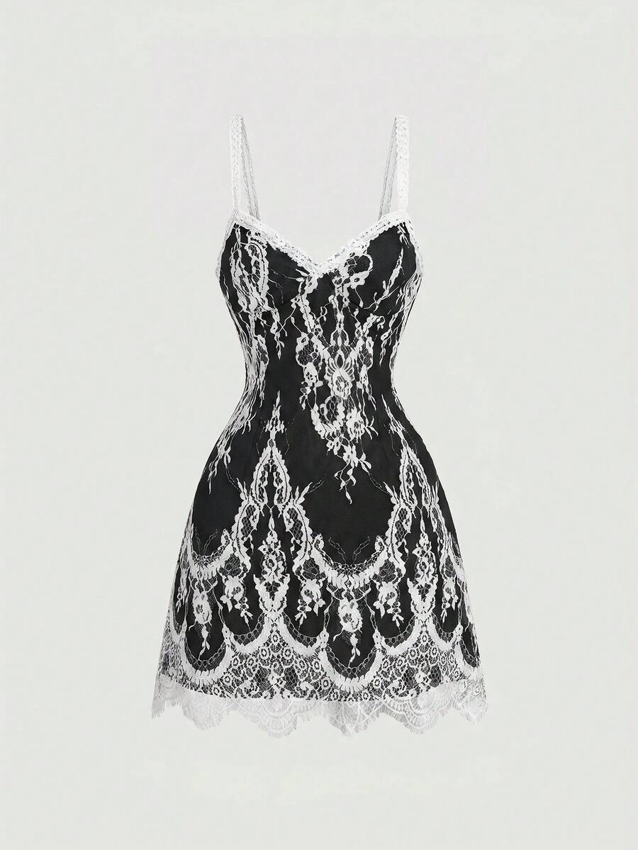 Women's short lace cami dress with spaghetti straps, contrast lace detailing, high waist, slim fit, and straight hem.