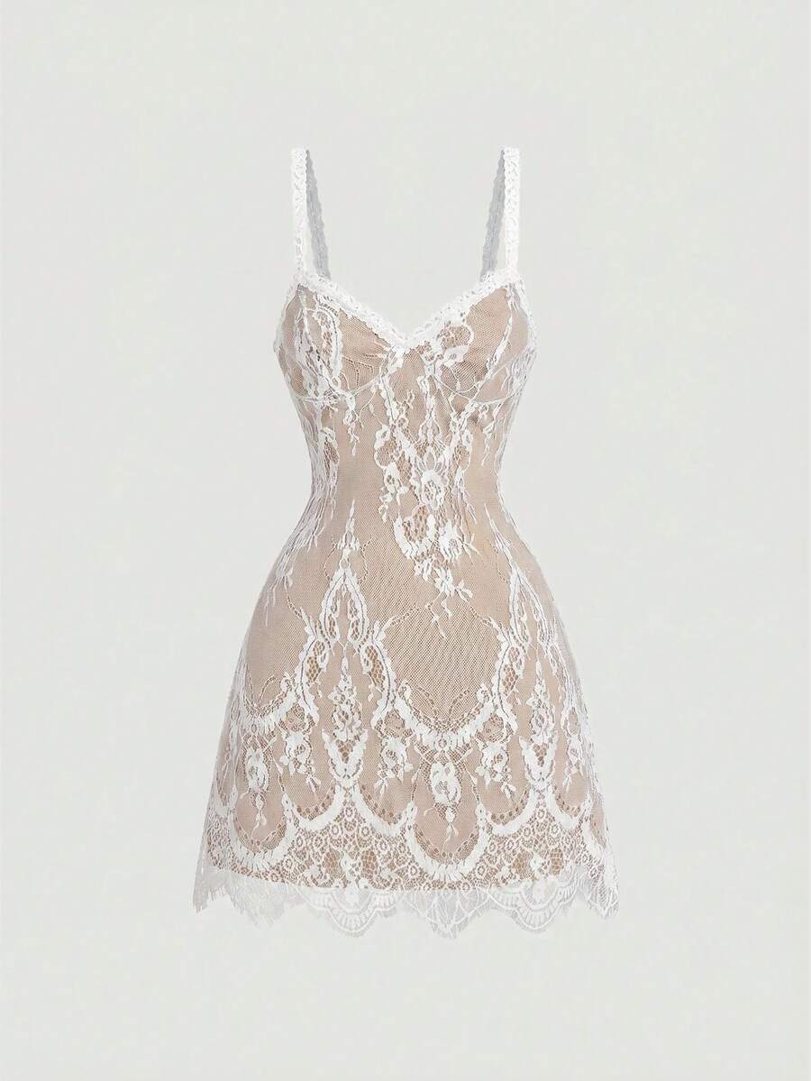 Women's short lace cami dress with spaghetti straps, contrast lace detailing, high waist, slim fit, and straight hem.
