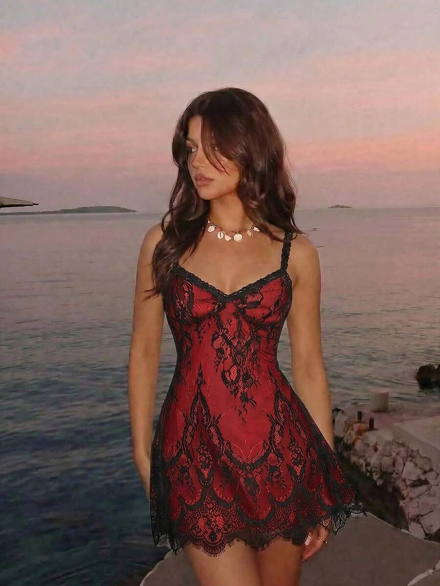Women's short lace cami dress with spaghetti straps, contrast lace detailing, high waist, slim fit, and straight hem.