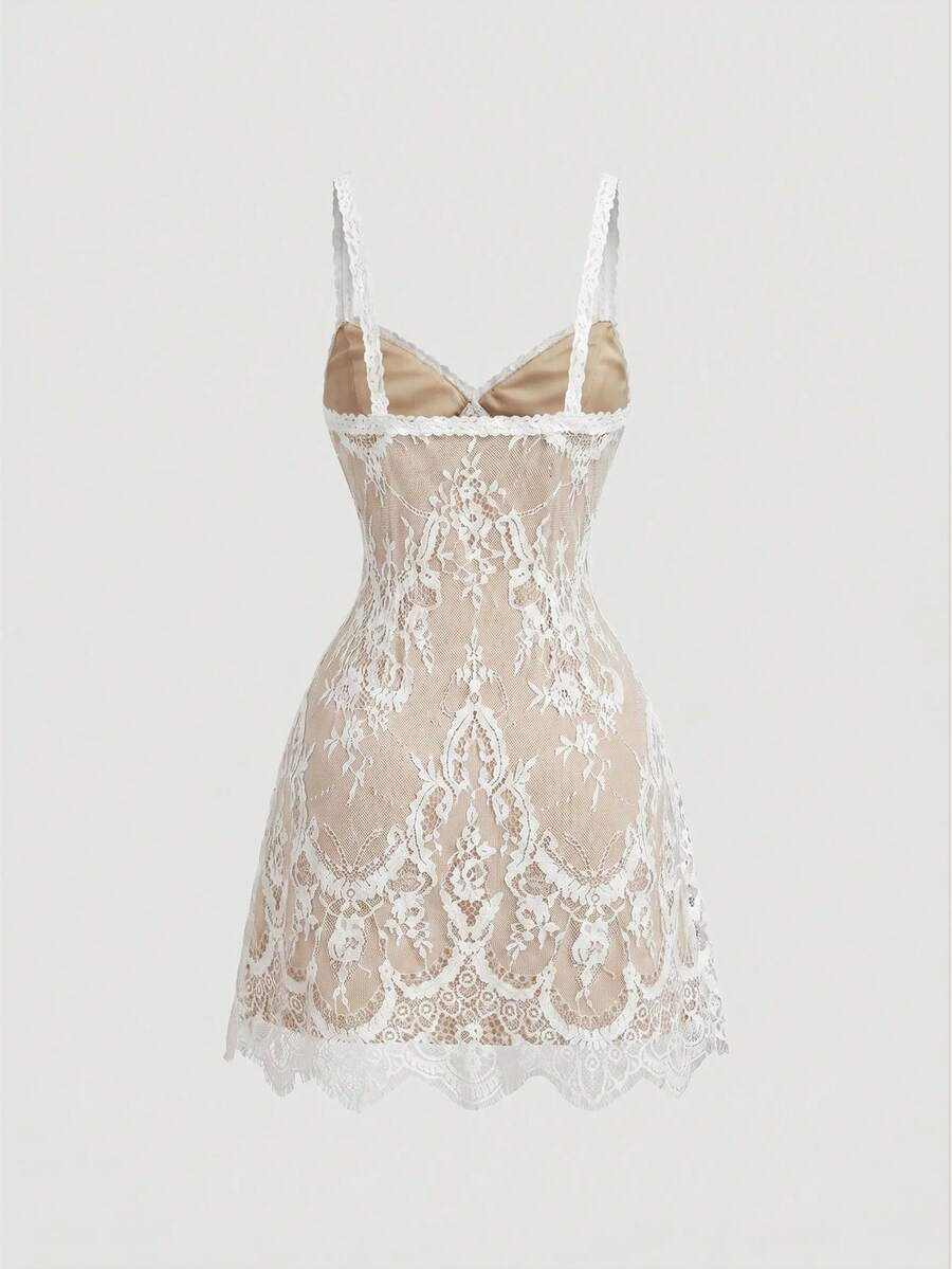 Women's short lace cami dress with spaghetti straps, contrast lace detailing, high waist, slim fit, and straight hem.