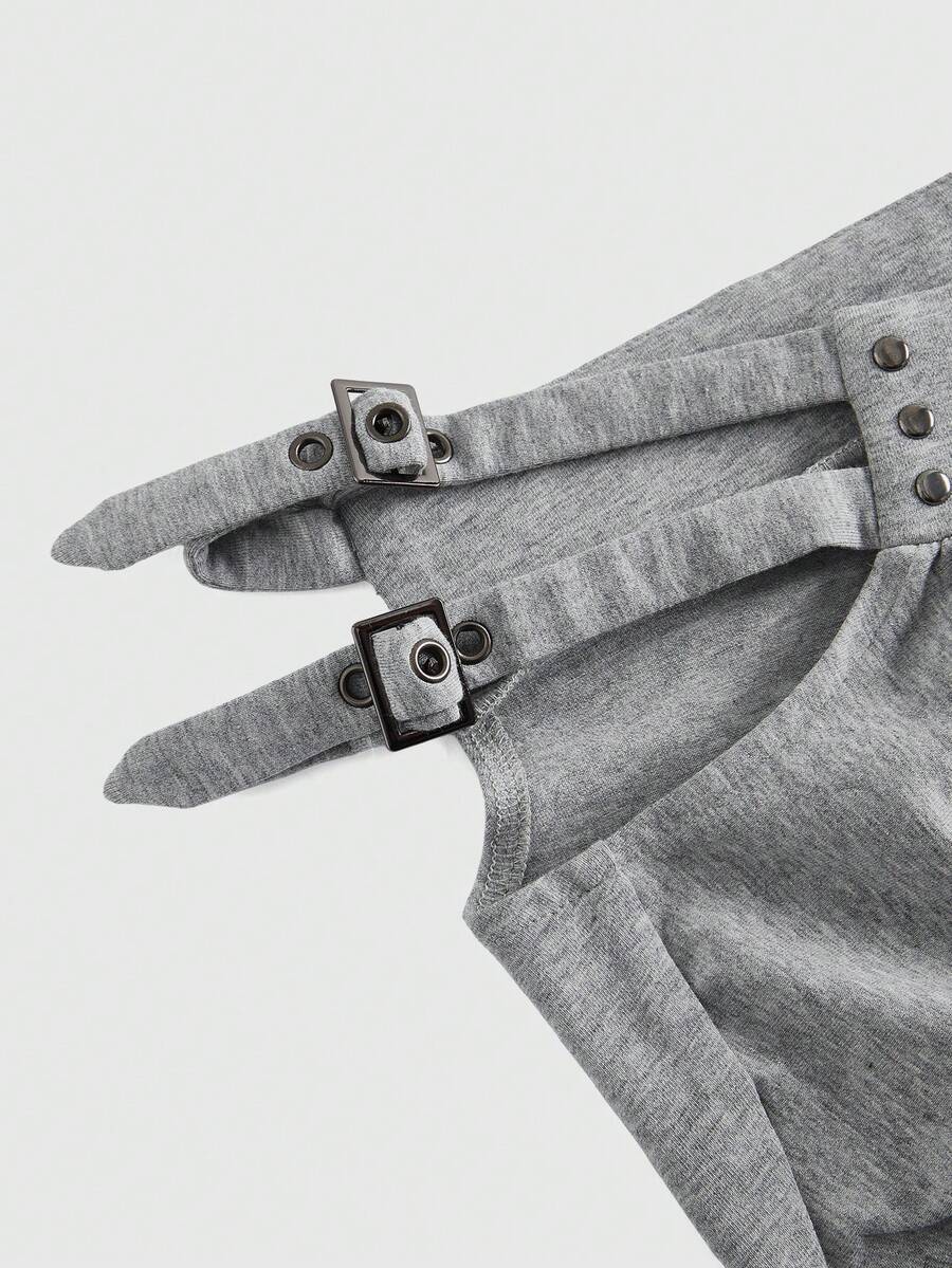 Women's grey Y2K two-piece set featuring an off-the-shoulder crop top with studded details and matching mini shorts.