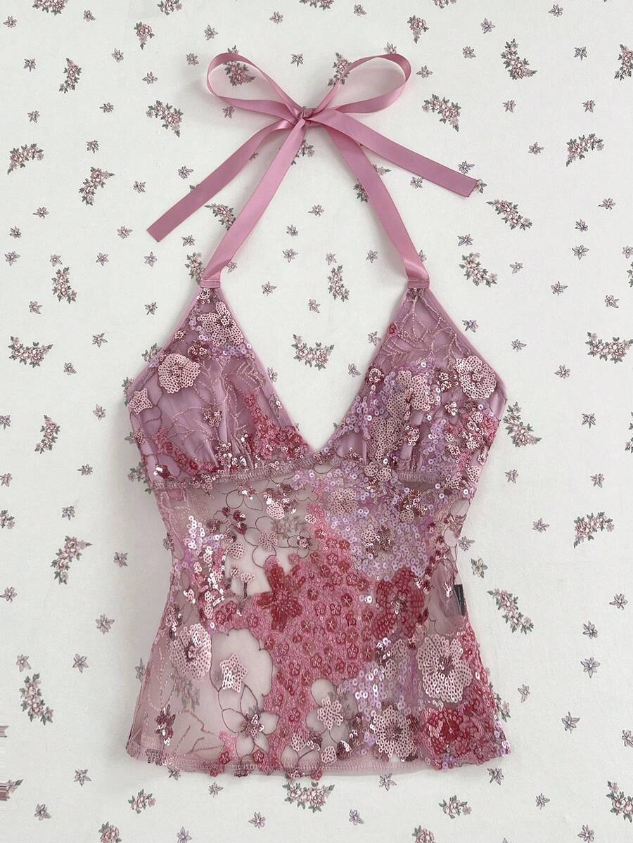 Pink sheer lace tie-up halter crop top featuring floral sequin patchwork, deep V-neck, and backless tie-back design.