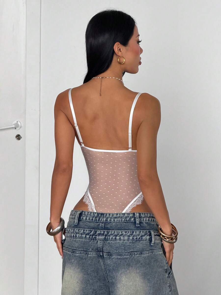 Fitted women's lace and mesh cami bodysuit with spaghetti straps.