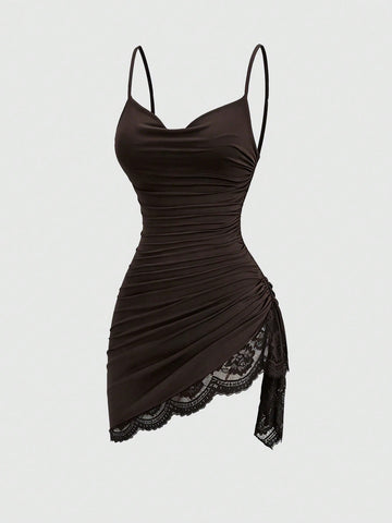Women's short cami dress with cowl neck, spaghetti straps, contrast lace patchwork, pleated detail, and asymmetrical hem