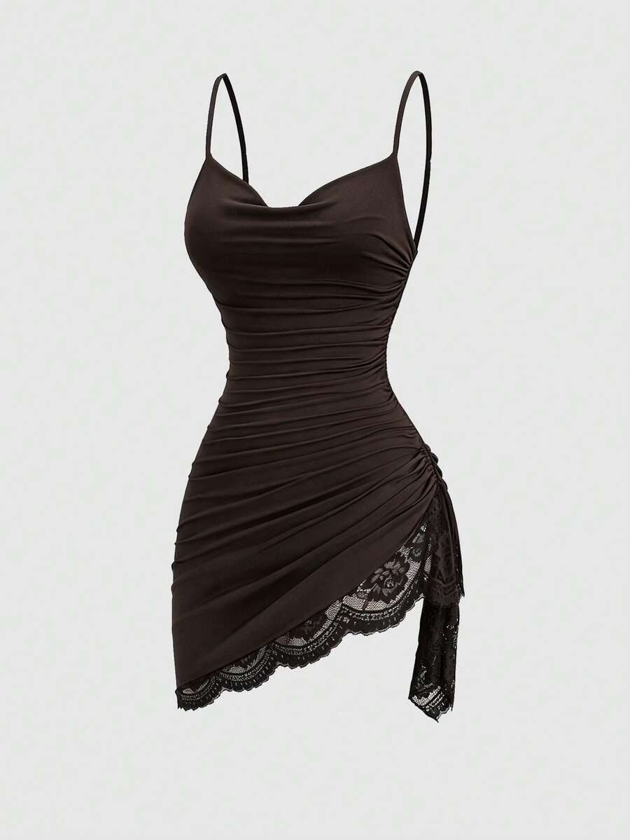 Women's short cami dress with cowl neck, spaghetti straps, contrast lace patchwork, pleated detail, and asymmetrical hem