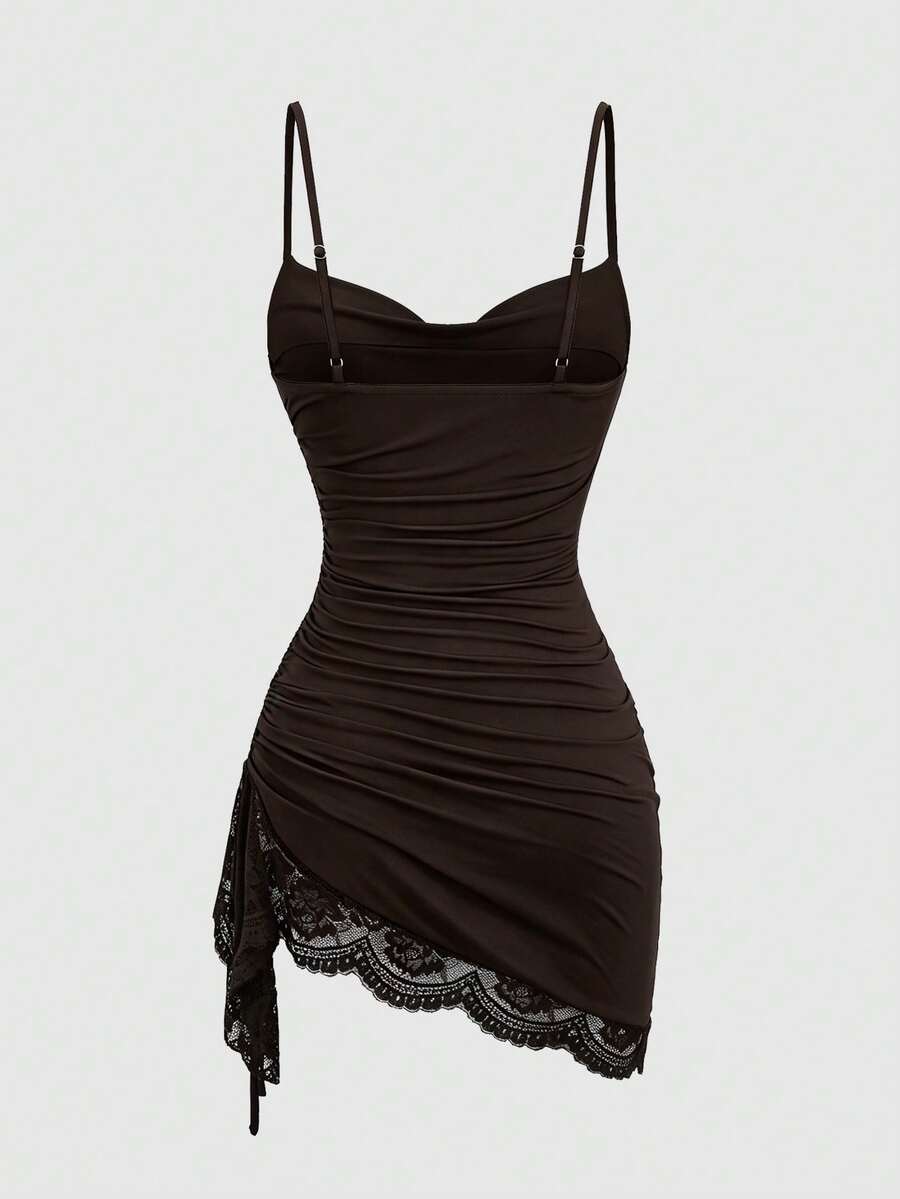 Women's short cami dress with cowl neck, spaghetti straps, contrast lace patchwork, pleated detail, and asymmetrical hem