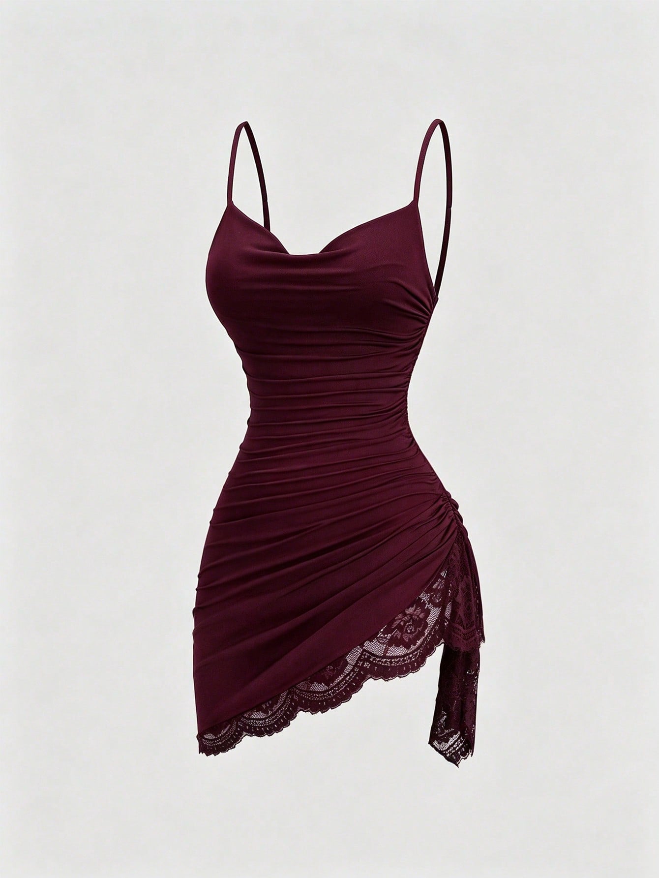 Women's short cami dress with cowl neck, spaghetti straps, contrast lace patchwork, pleated detail, and asymmetrical hem
