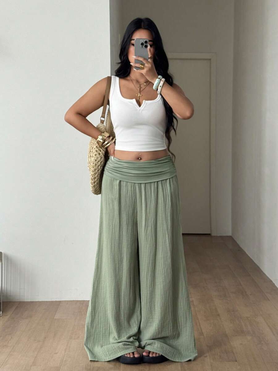 Women's plus size wide leg cotton pants featuring a relaxed loose fit and high waist design.