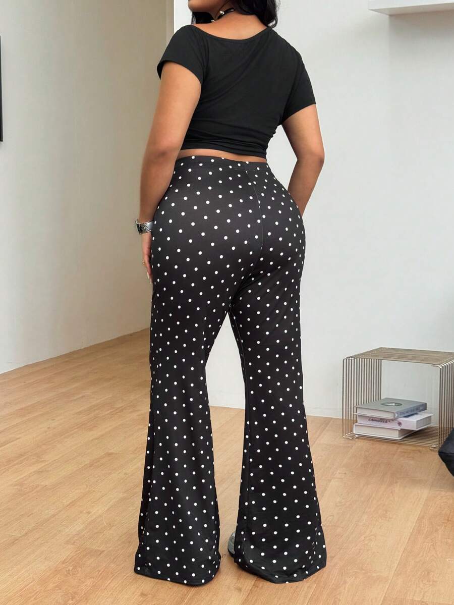 Women's plus size black flare leg pants with high elastic waist in stretchy knit fabric
