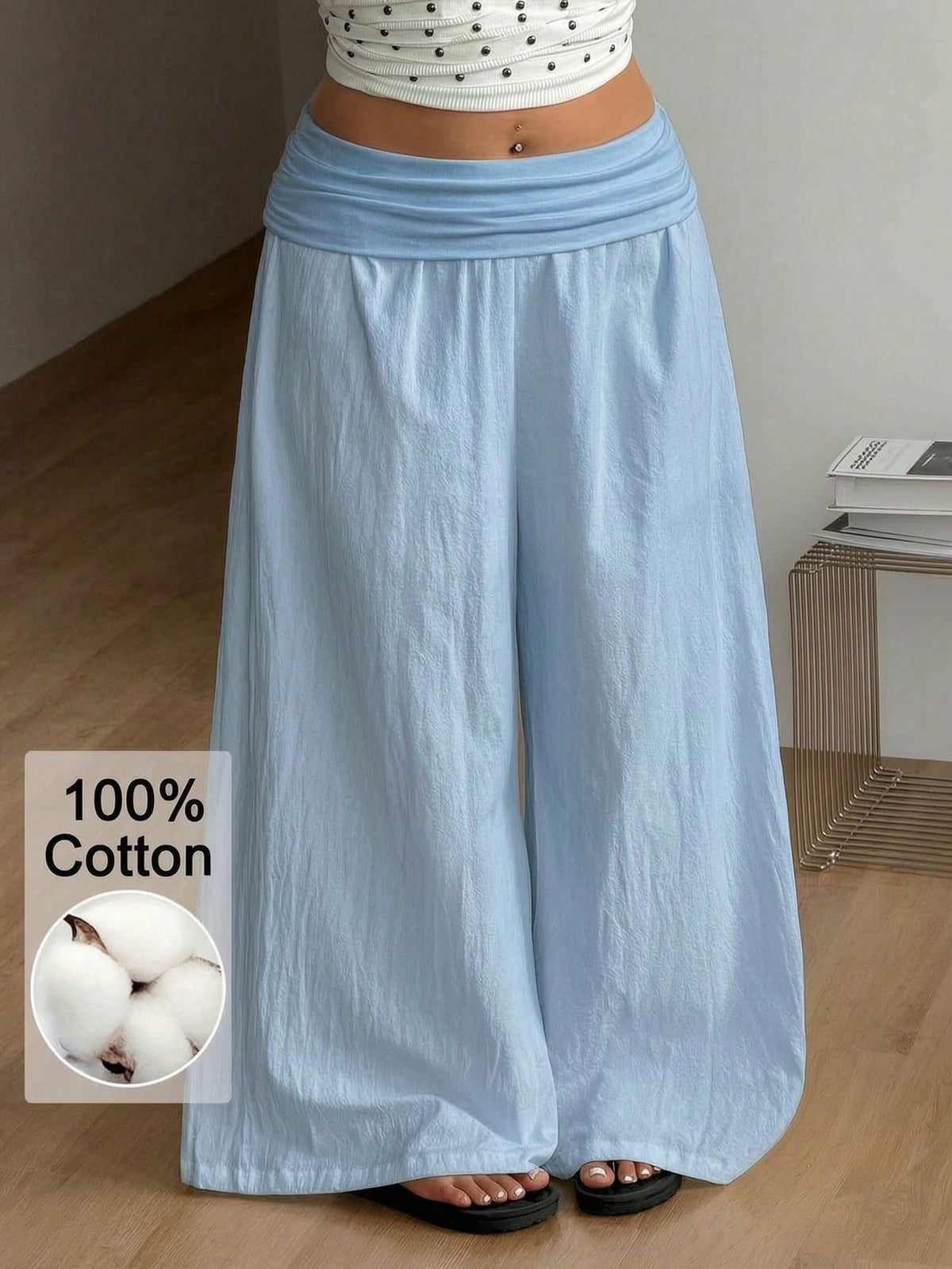 Women's plus size wide leg cotton pants featuring a relaxed loose fit and high waist design.