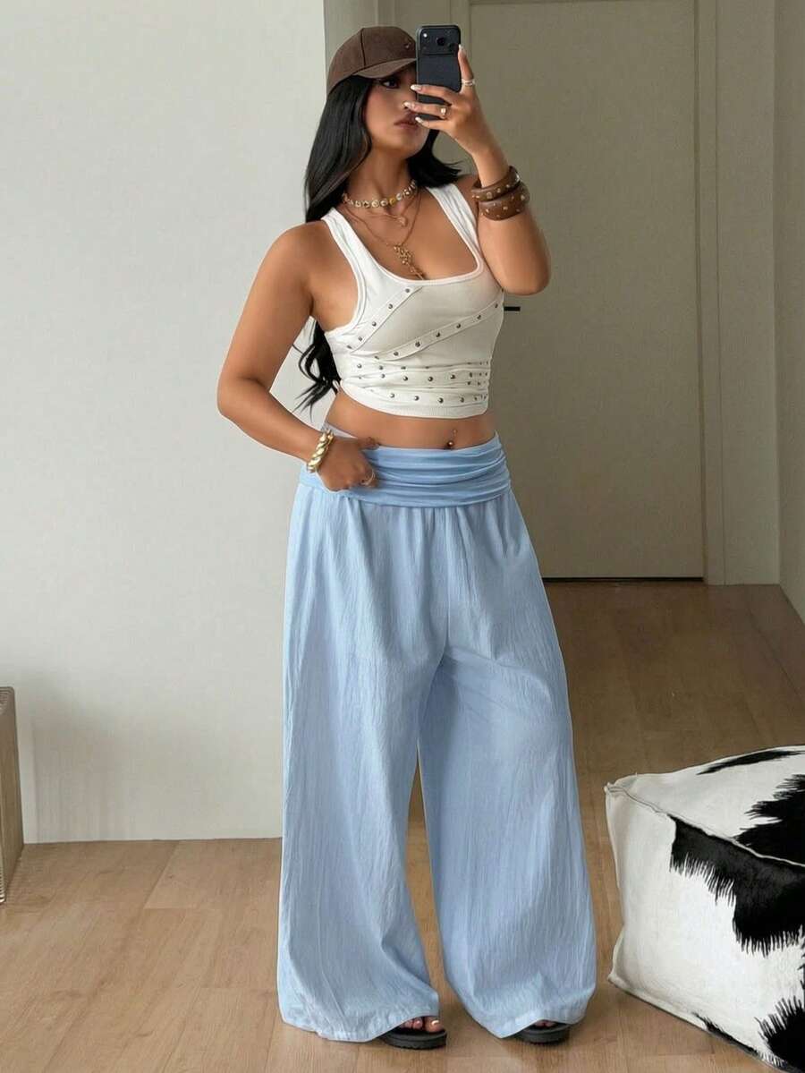 Women's plus size wide leg cotton pants featuring a relaxed loose fit and high waist design.