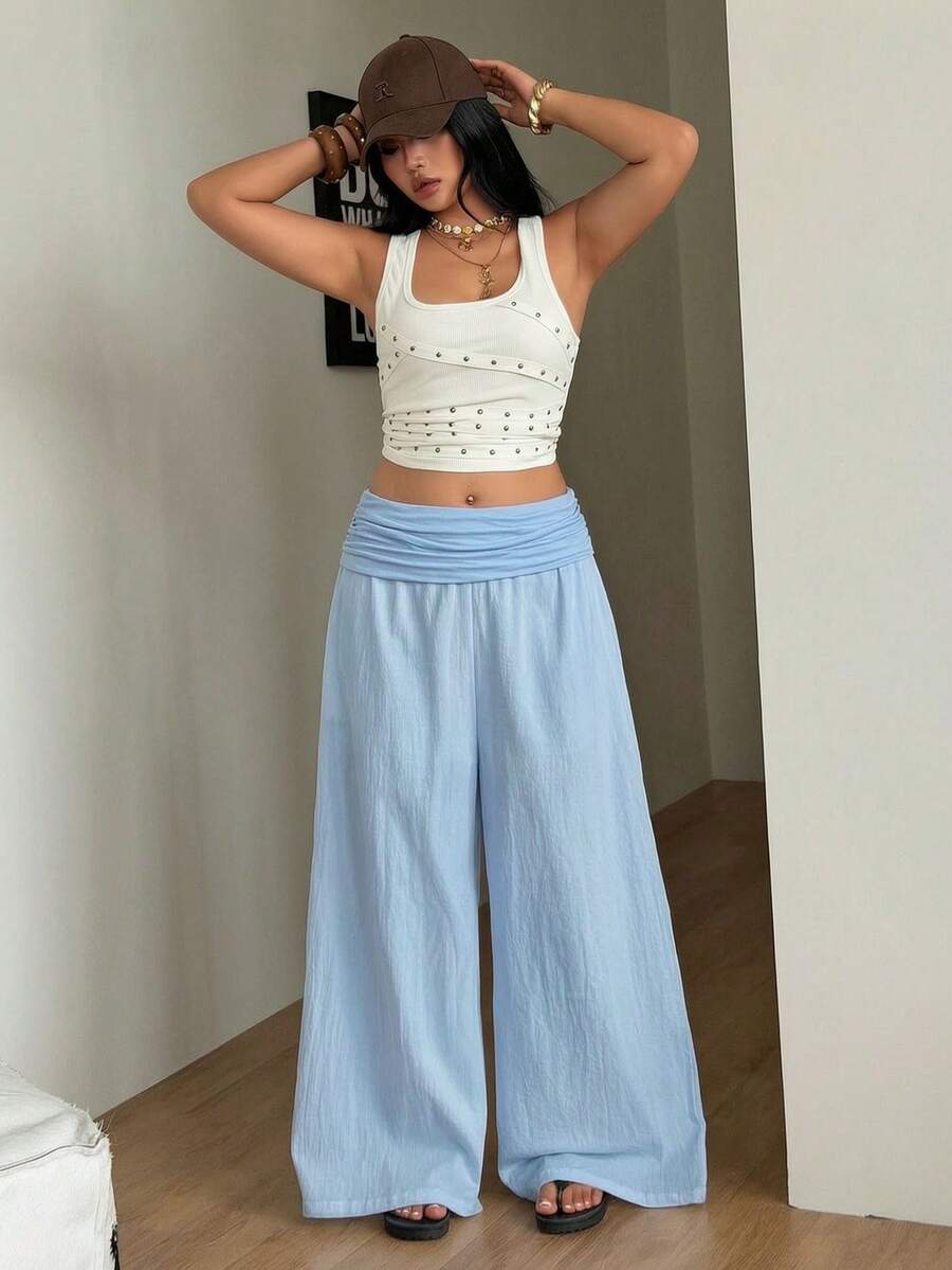 Women's plus size wide leg cotton pants featuring a relaxed loose fit and high waist design.
