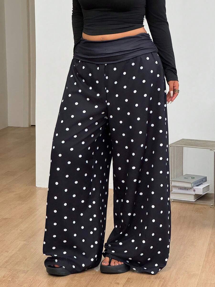 Women's plus size wide leg cotton pants featuring a relaxed loose fit and high waist design.