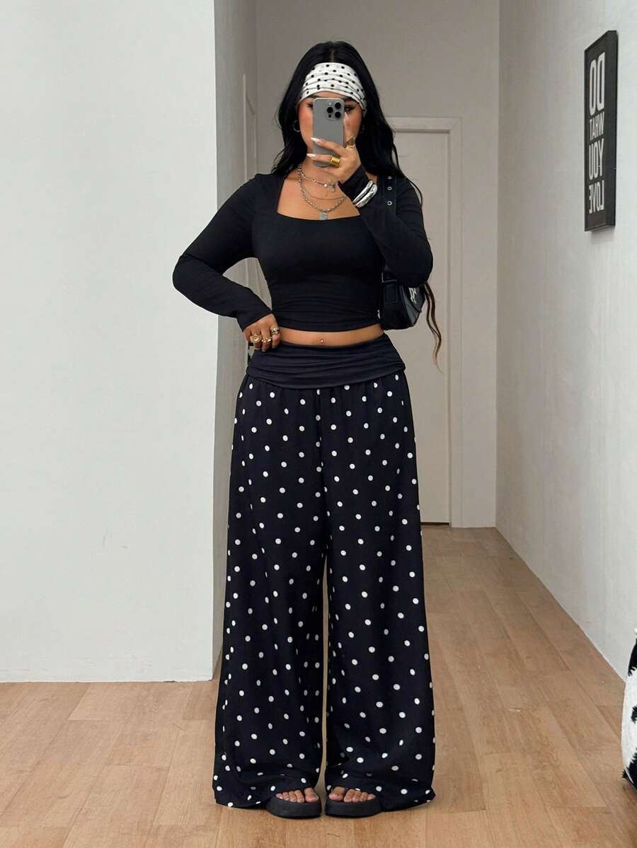 Women's plus size wide leg cotton pants featuring a relaxed loose fit and high waist design.