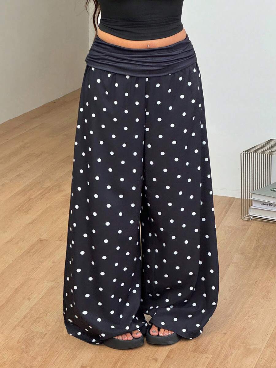 Women's plus size wide leg cotton pants featuring a relaxed loose fit and high waist design.
