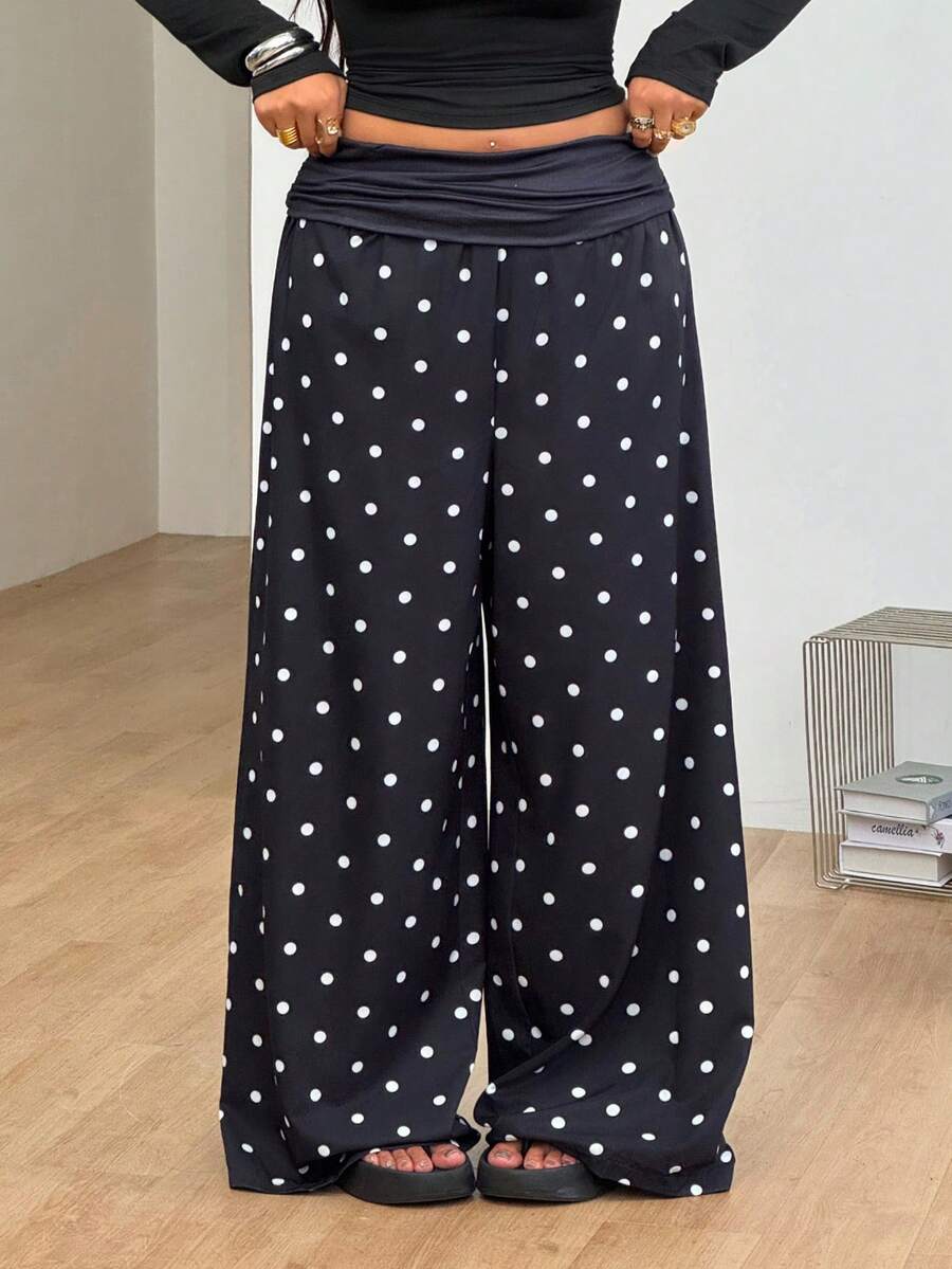 Women's plus size wide leg cotton pants featuring a relaxed loose fit and high waist design.