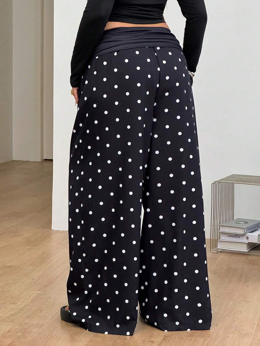 Women's plus size wide leg cotton pants featuring a relaxed loose fit and high waist design.