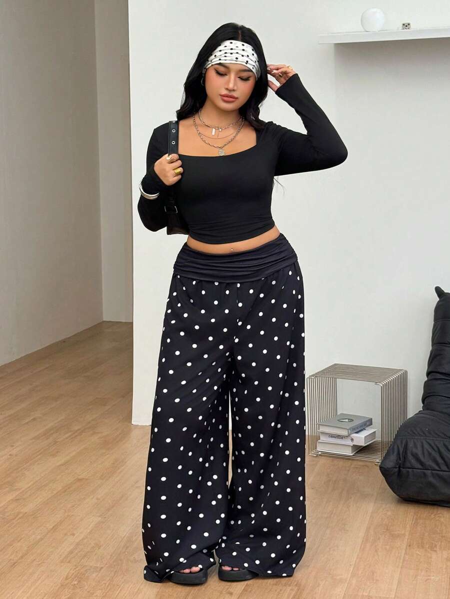 Women's plus size wide leg cotton pants featuring a relaxed loose fit and high waist design.