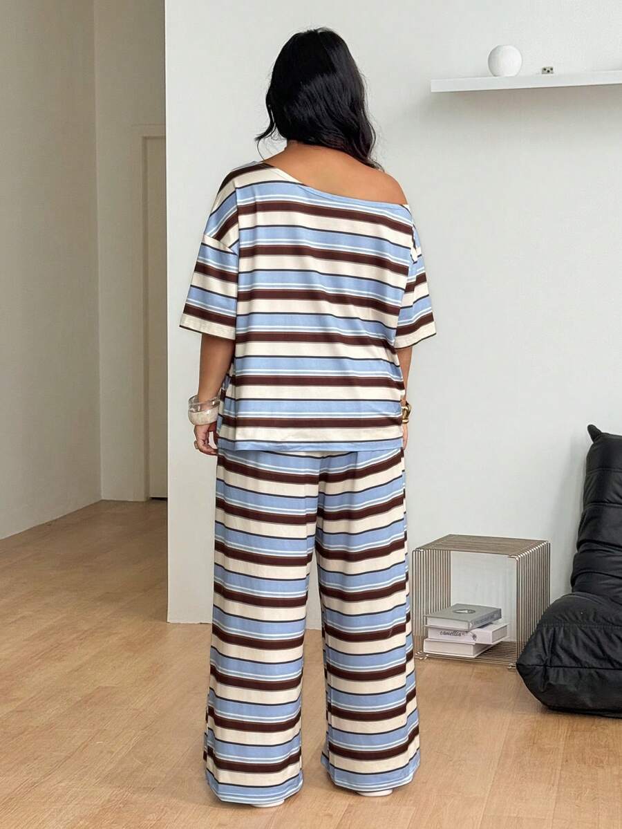 Striped two-piece casual outfit featuring an asymmetrical off-shoulder short-sleeve top and matching loose wide-leg pants with side pockets.