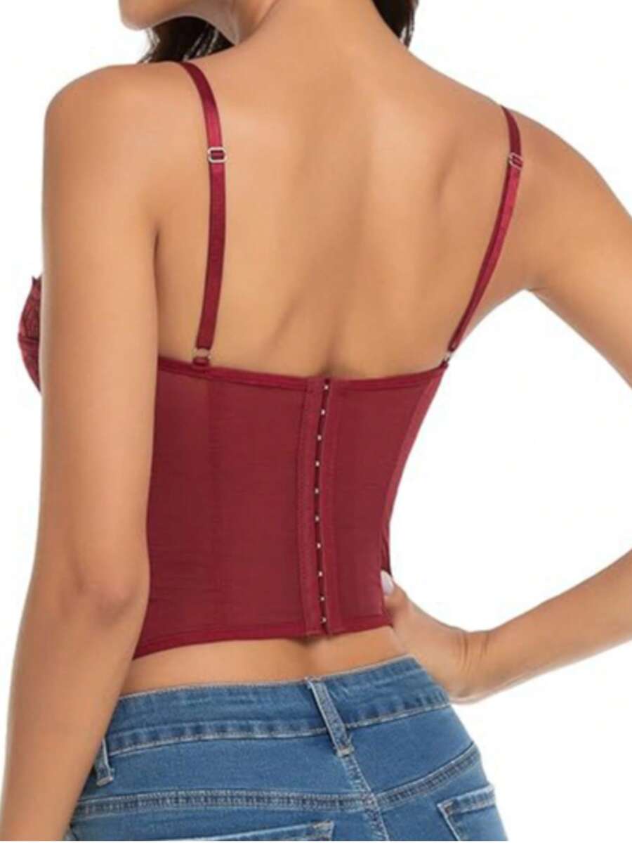 Women's lace bustier corset cami top with spaghetti straps, arm sleeves, asymmetrical contrast lace detail, and buckle accent