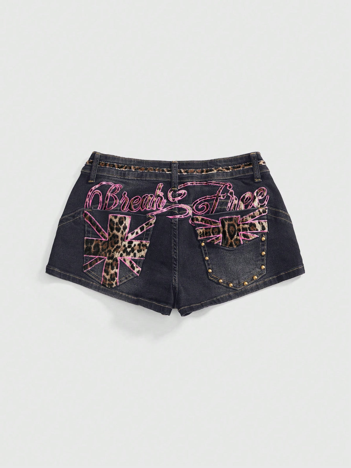 Women's super low waist shorts with leopard print embroidery, button and zipper closure, and raw hem detailing.