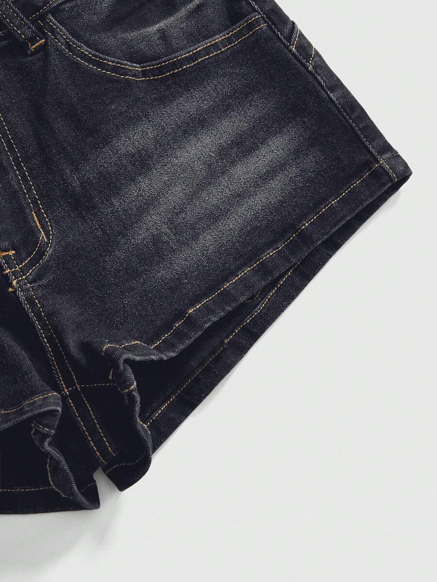 Women's super low waist shorts with leopard print embroidery, button and zipper closure, and raw hem detailing.