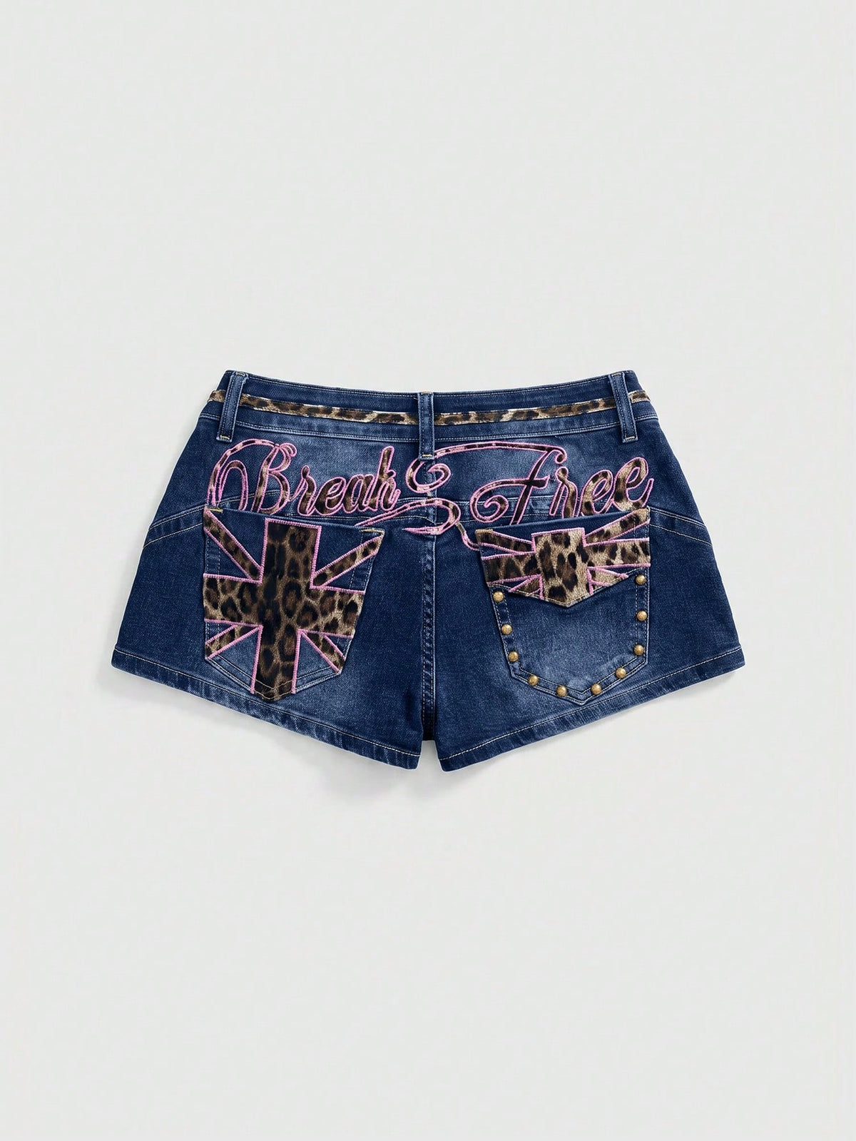 Women's super low waist shorts with leopard print embroidery, button and zipper closure, and raw hem detailing.