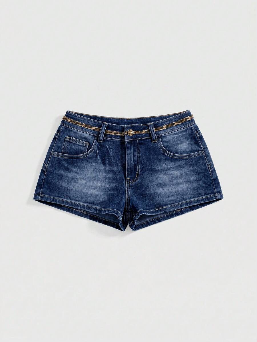 Women's super low waist shorts with leopard print embroidery, button and zipper closure, and raw hem detailing.
