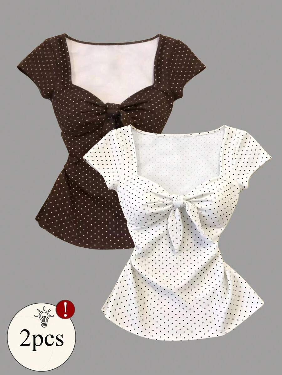 Women's short sleeve fitted t-shirt with a front knot detail, contrast collar, and raglan sleeves.