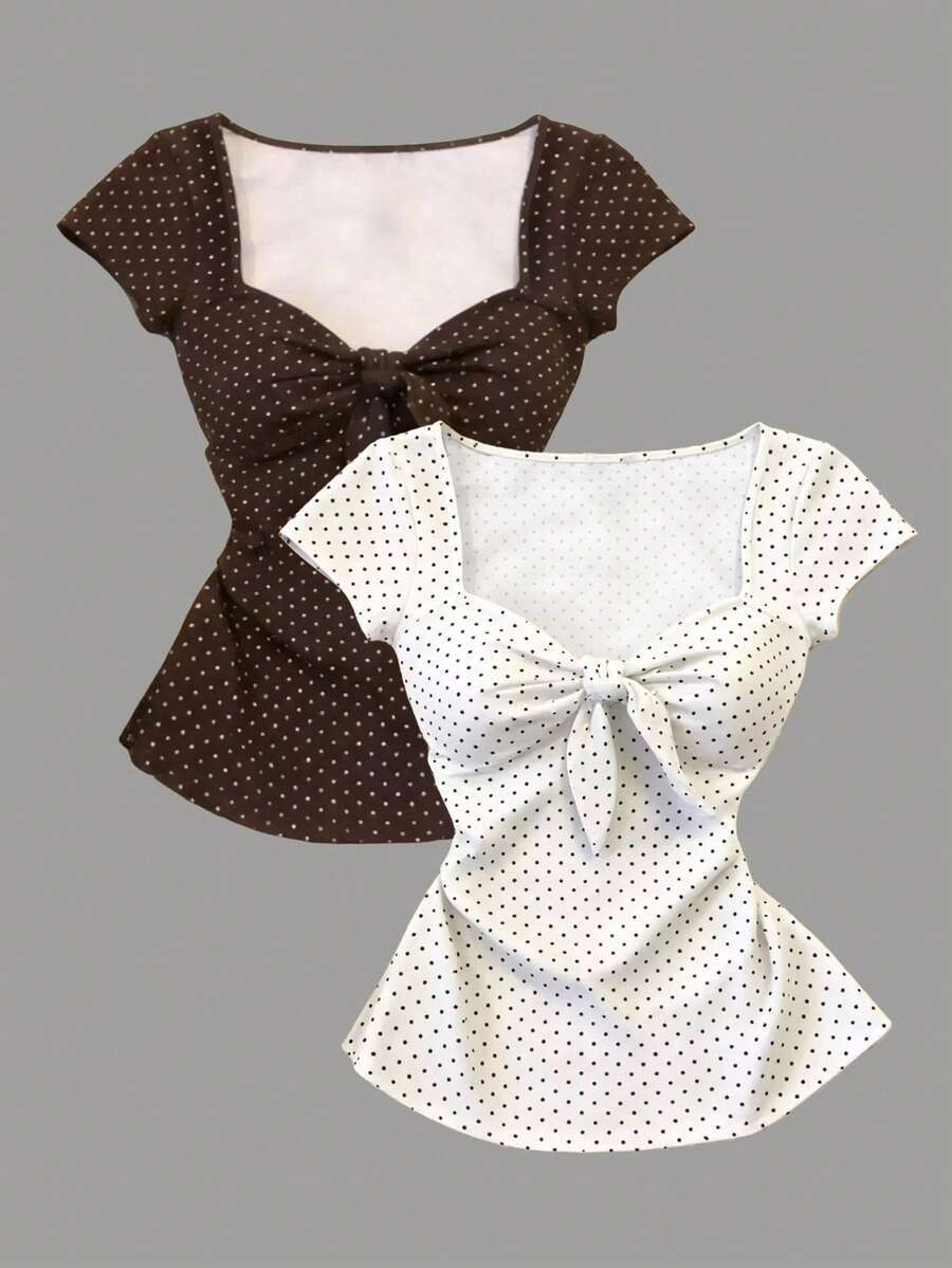 Women's short sleeve fitted t-shirt with a front knot detail, contrast collar, and raglan sleeves.