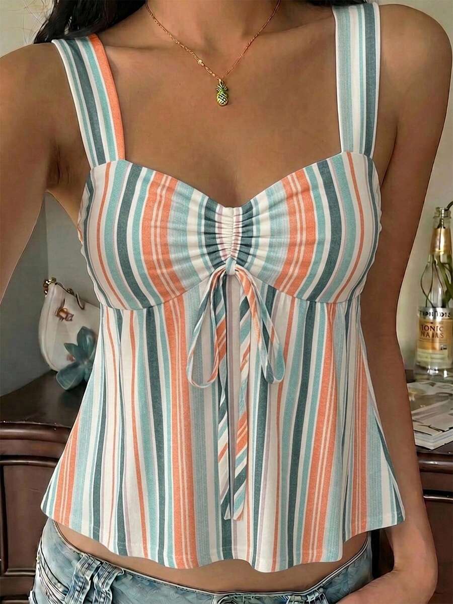 Women's striped camisole tank top with strap neckline, backless knot detail, cold shoulder styling, slim fit, and flared hem for casual vacation or daily wear.