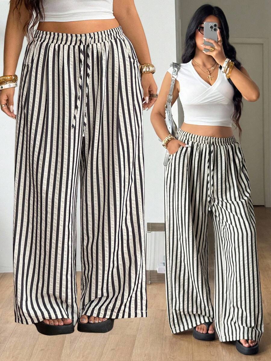 Women's loose straight leg cotton pants featuring a high waist with an adjustable drawstring knot and functional side pockets.