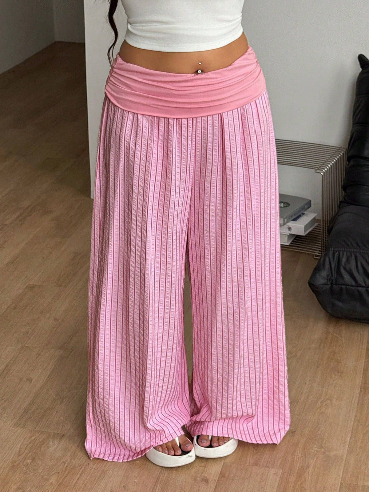 Women's plus size wide leg cotton pants featuring a relaxed loose fit and high waist design.