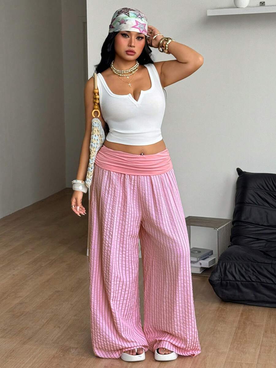 Women's plus size wide leg cotton pants featuring a relaxed loose fit and high waist design.