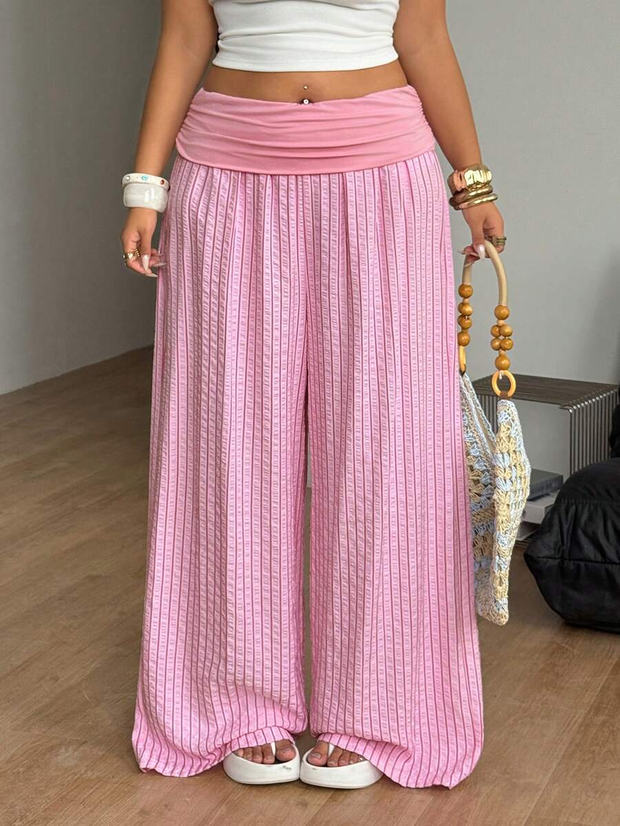 Women's plus size wide leg cotton pants featuring a relaxed loose fit and high waist design.